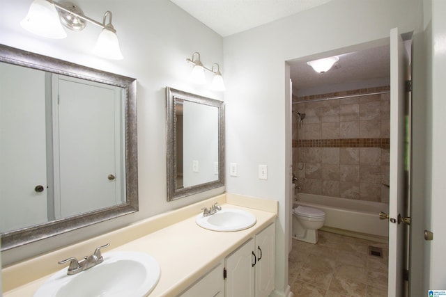 302 Old Rocky Ridge Ln, Birmingham, AL 35216 - full bathroom with toilet, double vanity, a sink, and tile patterned flooring