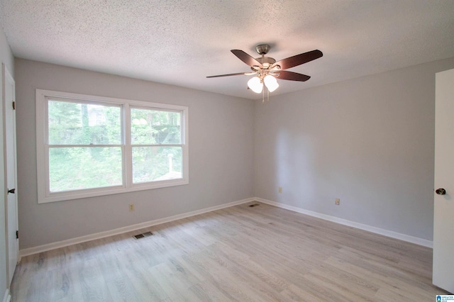 302 Old Rocky Ridge Ln, Birmingham, AL 35216 - empty room featuring visible vents, ceiling fan, a textured ceiling, and light wood finished floors