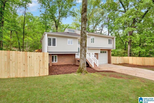 5600 Double Tree Cir, Birmingham, AL 35242 - back of house featuring concrete driveway, brick siding, and a garage