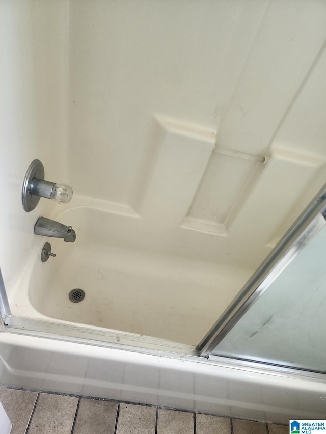 full bathroom featuring tile patterned floors