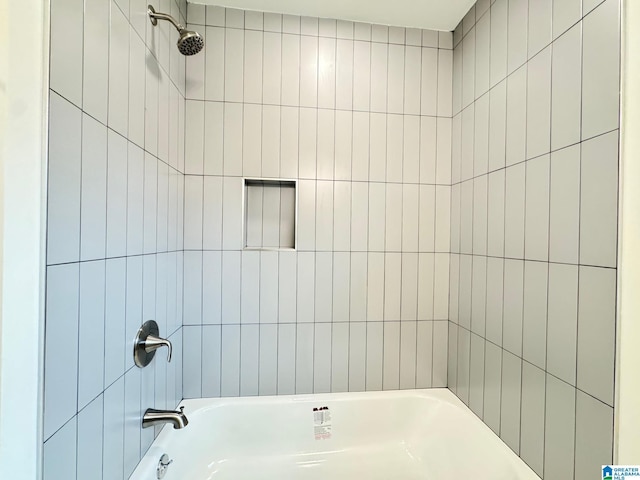 full bath with shower / tub combination