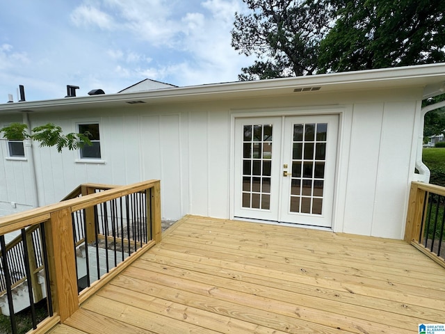 wooden terrace featuring french doors