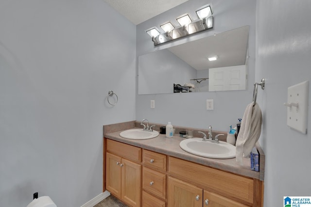 135 Hayden Springs Rd, Hayden, AL 35079 - bathroom featuring double vanity and a sink