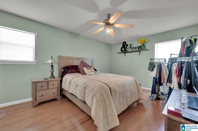 135 Hayden Springs Rd, Hayden, AL 35079 - bedroom with wood finished floors, a ceiling fan, and baseboards