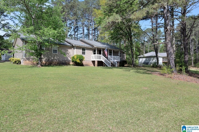 135 Hayden Springs Rd, Hayden, AL 35079 - ranch-style home with a porch and a front yard