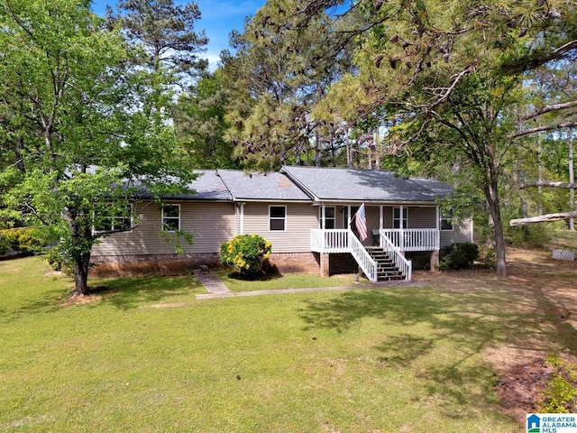 135 Hayden Springs Rd, Hayden, AL 35079 - back of house featuring covered porch and a yard