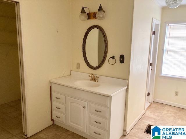 4905 Spunky Hollow Rd, Remlap, AL 35133 - bathroom featuring a healthy amount of sunlight and vanity