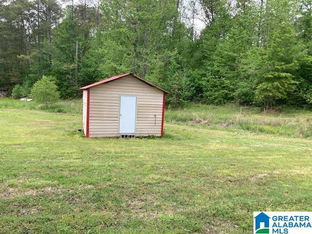 4905 Spunky Hollow Rd, Remlap, AL 35133 - view of shed with a view of trees