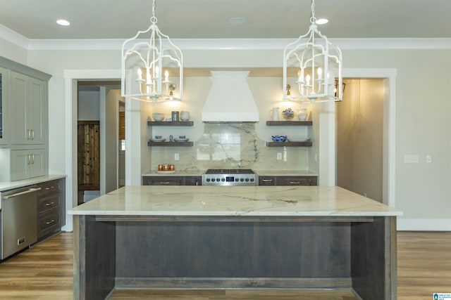 kitchen with open shelves, custom range hood, stove, and a chandelier