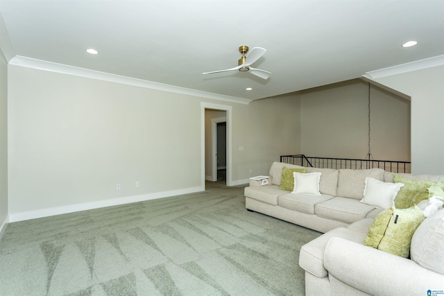 carpeted living room with recessed lighting, ornamental molding, baseboards, and ceiling fan