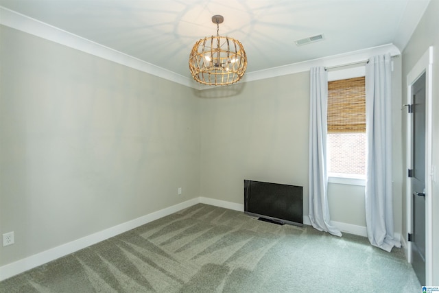 carpeted empty room with baseboards, ornamental molding, a notable chandelier, and visible vents