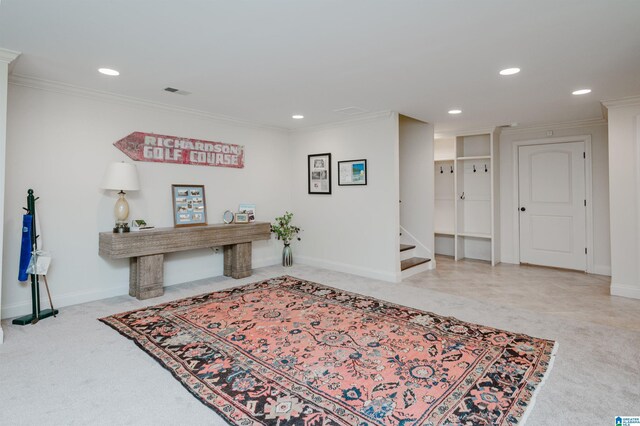interior space with crown molding, visible vents, baseboards, stairway, and recessed lighting