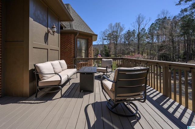 deck with outdoor lounge area