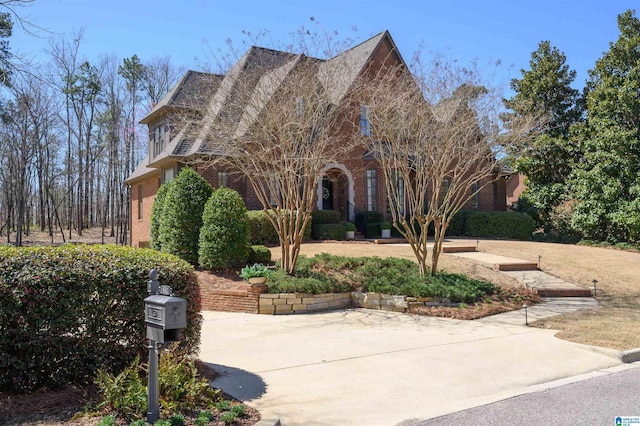view of front of house featuring brick siding