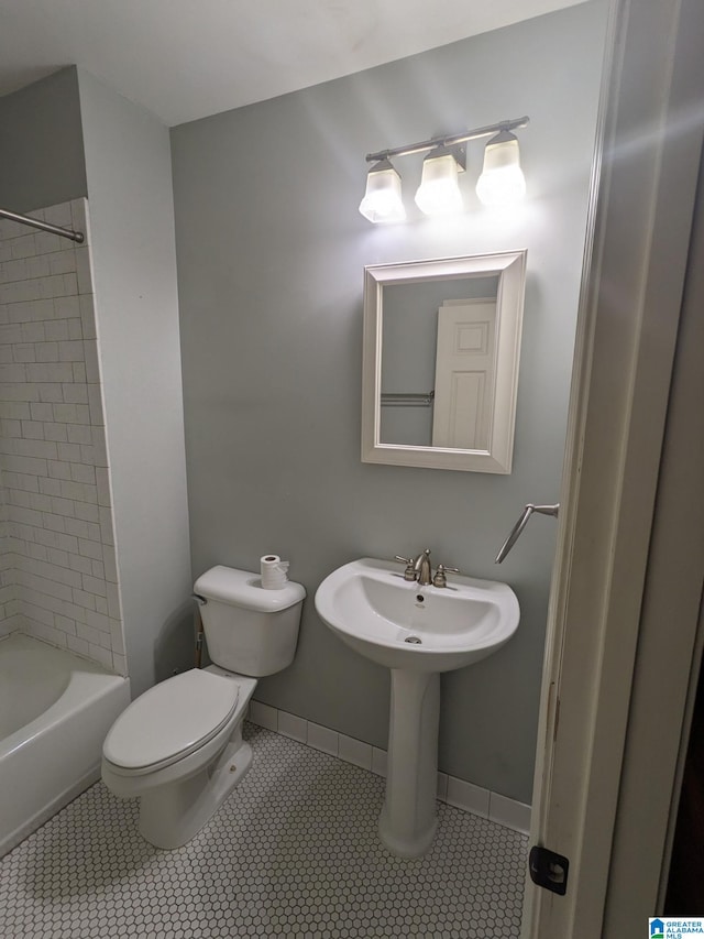 2128 Rockland Dr, Hoover, AL 35226 - bathroom with toilet, tile patterned floors, and shower / tub combination