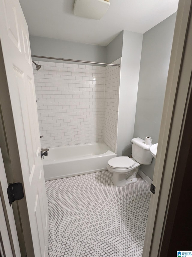 2128 Rockland Dr, Hoover, AL 35226 - bathroom featuring toilet, tile patterned floors, and tub / shower combination