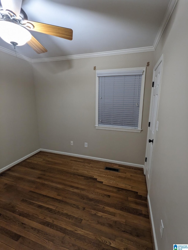 2128 Rockland Dr, Hoover, AL 35226 - unfurnished room featuring dark wood-style floors, crown molding, a ceiling fan, and baseboards
