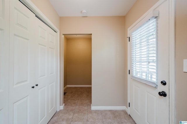 2128 Rockland Dr, Hoover, AL 35226 - doorway with light tile patterned floors and baseboards