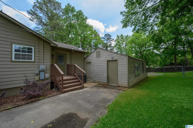 2128 Rockland Dr, Hoover, AL 35226 - rear view of property with an outbuilding