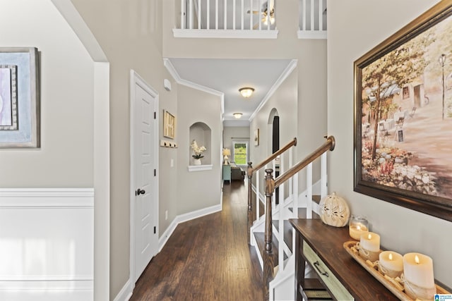 1104 Norman Way, Birmingham, AL 35242 - foyer featuring crown molding, arched walkways, baseboards, wood finished floors, and stairway