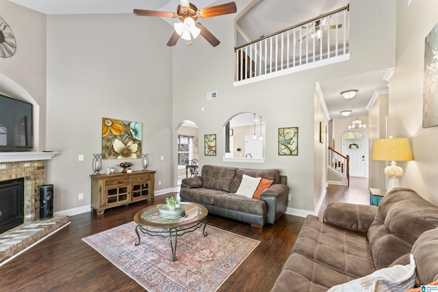1104 Norman Way, Birmingham, AL 35242 - living area with arched walkways, a high ceiling, visible vents, and ceiling fan