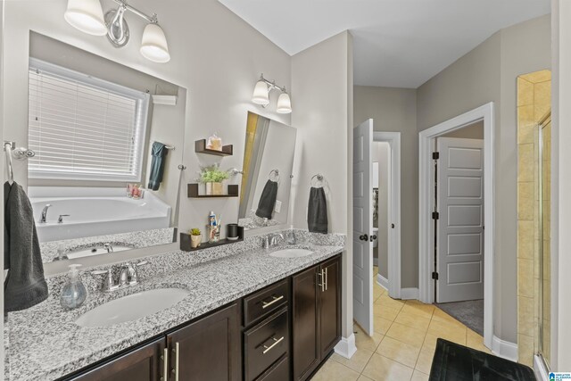 1104 Norman Way, Birmingham, AL 35242 - bathroom with baseboards, a sink, tile patterned floors, and a stall shower