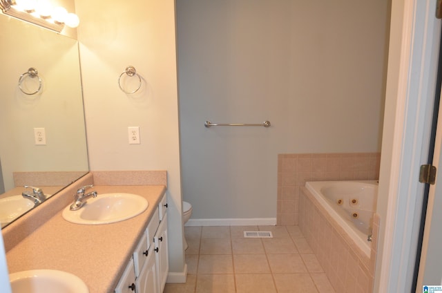 full bathroom with tile patterned floors, visible vents, a tub with jets, and a sink
