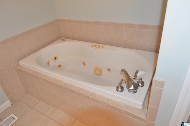 full bathroom featuring a tub with jets, tile patterned flooring, and visible vents