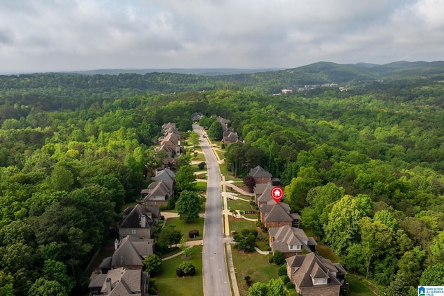 bird's eye view with a view of trees and a residential view
