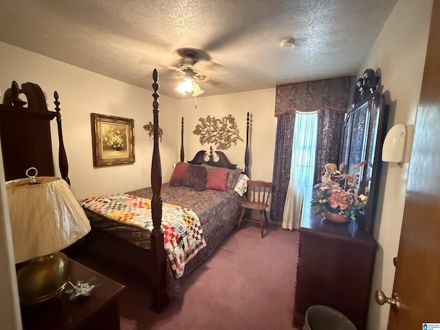 bedroom with carpet, a ceiling fan, and a textured ceiling