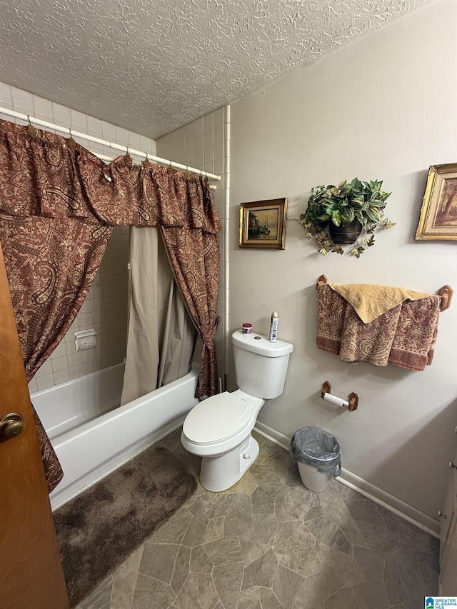 full bathroom with baseboards, shower / bath combo, toilet, and a textured ceiling