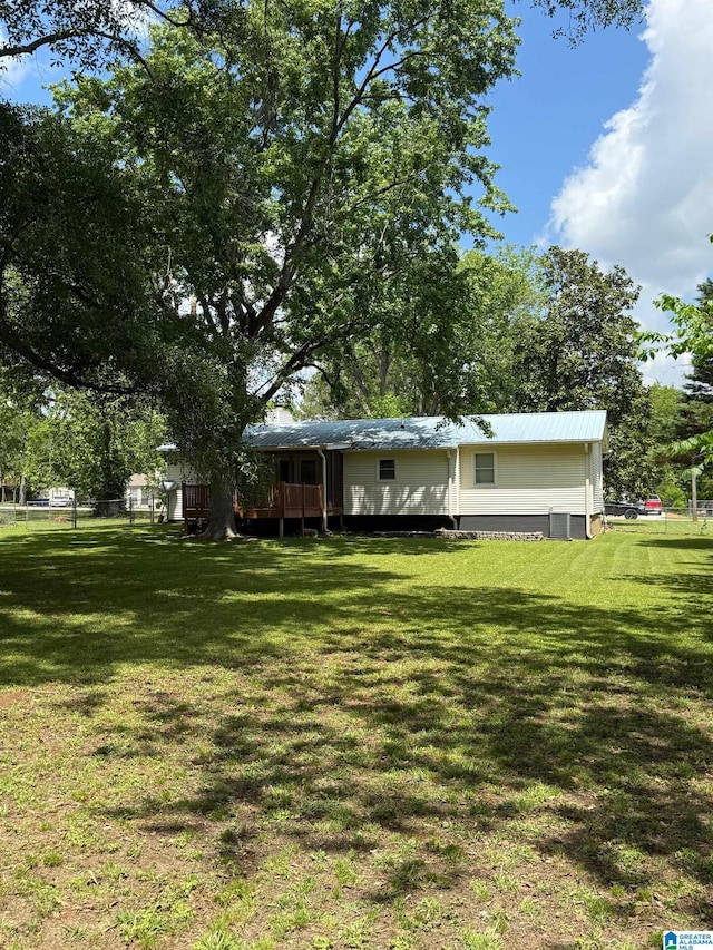 view of yard with a deck