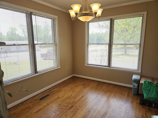 576 Chandler Mountain Rd, Steele, AL 35987 - empty room with a chandelier, a wealth of natural light, ornamental molding, baseboards, and visible vents