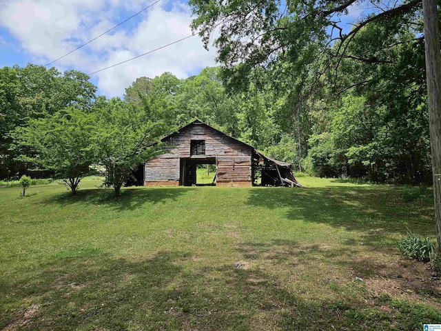 576 Chandler Mountain Rd, Steele, AL 35987 - exterior space with an outdoor structure and a barn