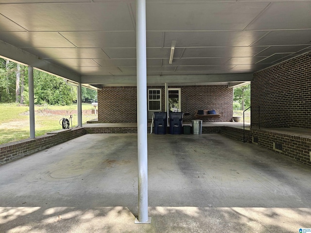 576 Chandler Mountain Rd, Steele, AL 35987 - view of patio / terrace featuring an attached carport