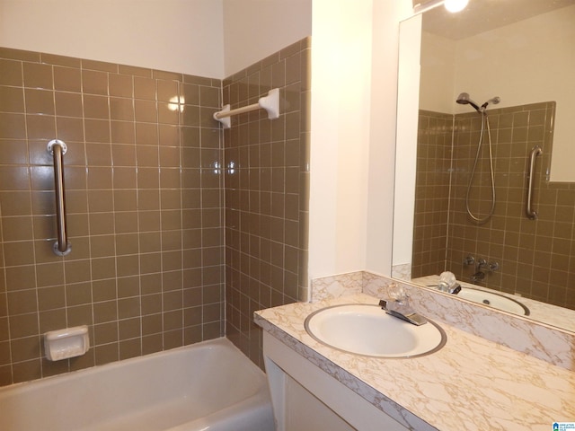 full bathroom featuring washtub / shower combination and vanity
