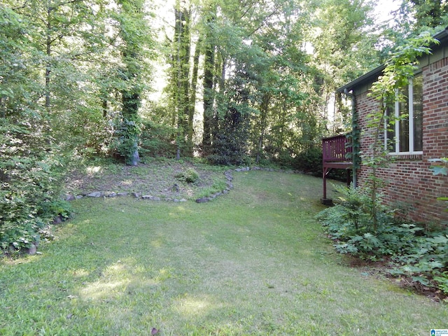 view of yard featuring a deck