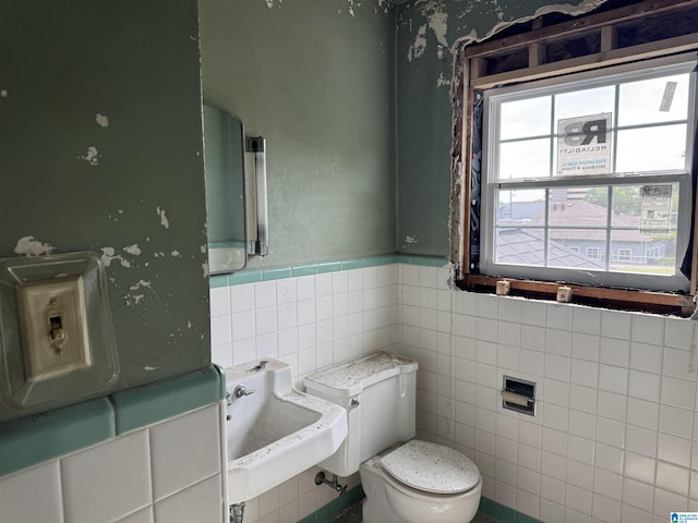 2030 Leighton Ave, Anniston, AL 36207 - bathroom with a sink, toilet, and tile walls