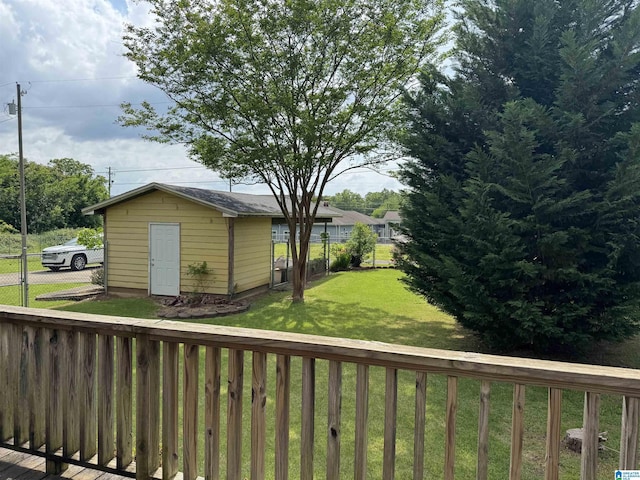 2030 Leighton Ave, Anniston, AL 36207 - exterior space with fence, a yard, a shed, and an outbuilding