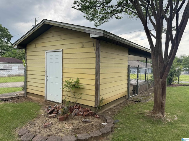 2030 Leighton Ave, Anniston, AL 36207 - view of shed featuring fence
