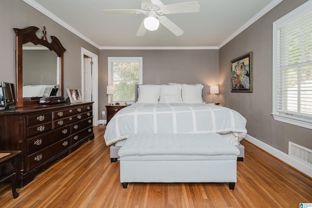 1426 Overlook Rd, Homewood, AL 35209 - bedroom featuring visible vents, wood finished floors, and ornamental molding