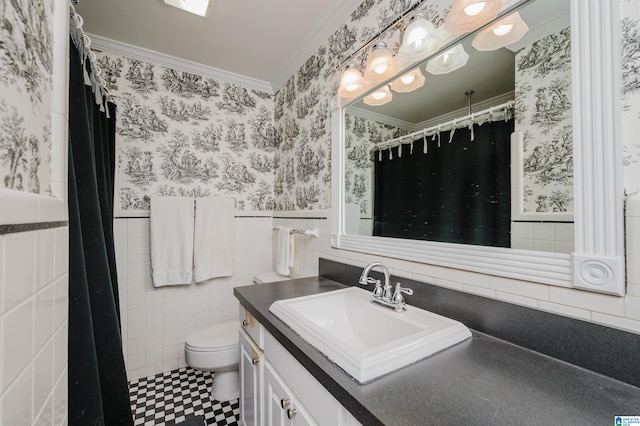 1426 Overlook Rd, Homewood, AL 35209 - bathroom featuring crown molding, wallpapered walls, toilet, vanity, and wainscoting