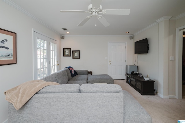 1426 Overlook Rd, Homewood, AL 35209 - living area with visible vents, ceiling fan, baseboards, ornamental molding, and light carpet