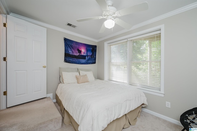 1426 Overlook Rd, Homewood, AL 35209 - carpeted bedroom featuring baseboards, visible vents, ornamental molding, and ceiling fan