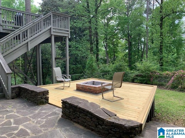 1426 Overlook Rd, Homewood, AL 35209 - deck featuring a fire pit, stairway, and a patio area