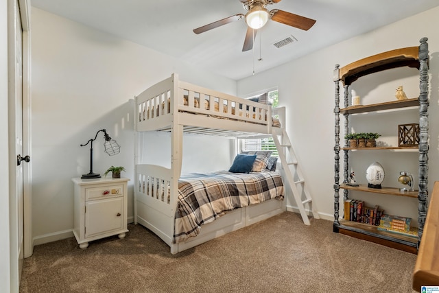 bedroom featuring baseboards, ceiling fan, carpet flooring, and visible vents