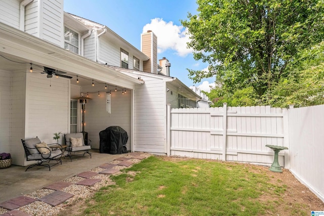 view of yard with fence and a patio area