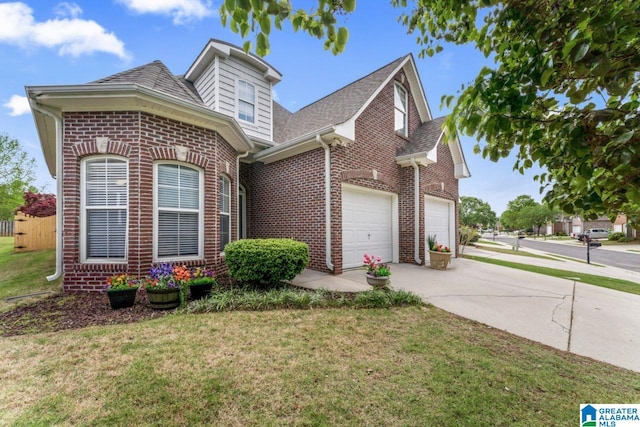 209 Vineyard Ln, Birmingham, AL 35242 - traditional-style home featuring brick siding, driveway, a front yard, and a garage