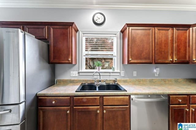 209 Vineyard Ln, Birmingham, AL 35242 - kitchen featuring stainless steel appliances, ornamental molding, and a sink
