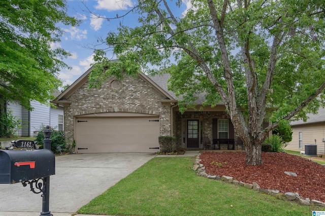 view of front of property featuring a front lawn, brick siding, a garage, central AC unit, and concrete driveway